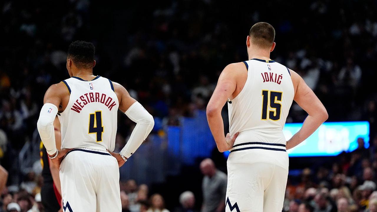 Denver Nuggets guard Russell Westbrook (4) and center Nikola Jokic (15) during the third quarter against the Atlanta Hawks at Ball Arena.