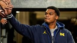 Michigan defensive back Will Johnson (2) high-fives fans during warm up before the Michigan State game at Michigan Stadium in Ann Arbor on Saturday, Oct. 26, 2024.