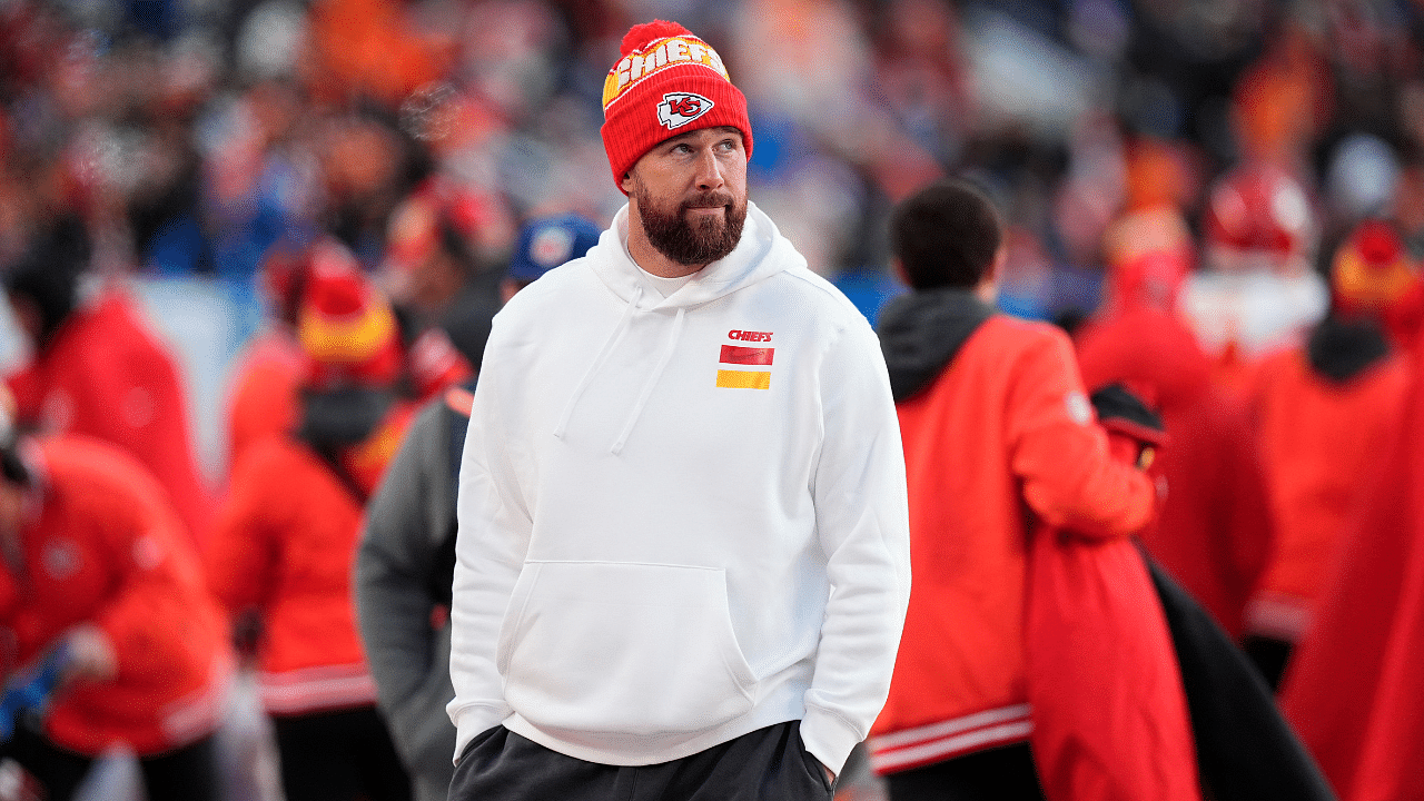 Kansas City Chiefs tight end Travis Kelce (87) walks the sidelines in the second half against the Denver Broncos at Empower Field at Mile High.