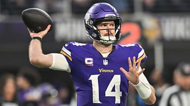 Dec 29, 2024; Minneapolis, Minnesota, USA; Minnesota Vikings quarterback Sam Darnold (14) throws a pass against the Green Bay Packers during the first quarter at U.S. Bank Stadium.