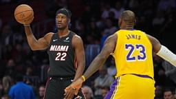 Miami Heat forward Jimmy Butler (22) looks to pass against Los Angeles Lakers forward LeBron James (23) in the first half at Kaseya Center.