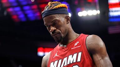 Miami Heat forward Jimmy Butler (22) walks off the court after the game against the Detroit Pistons at Little Caesars Arena.