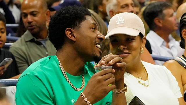 Washington Wizards forward Bradley Beal (L) talks with wife Kamiah Adams-Beal (R) while sitting in the player's box of Frances Tiafoe (USA) (not pictured) during the match against Carlos Alcaraz (ESP) (not pictured) in a men's singles semifinal on day twelve of the 2022 U.S. Open tennis tournament at USTA Billie Jean King Tennis Center