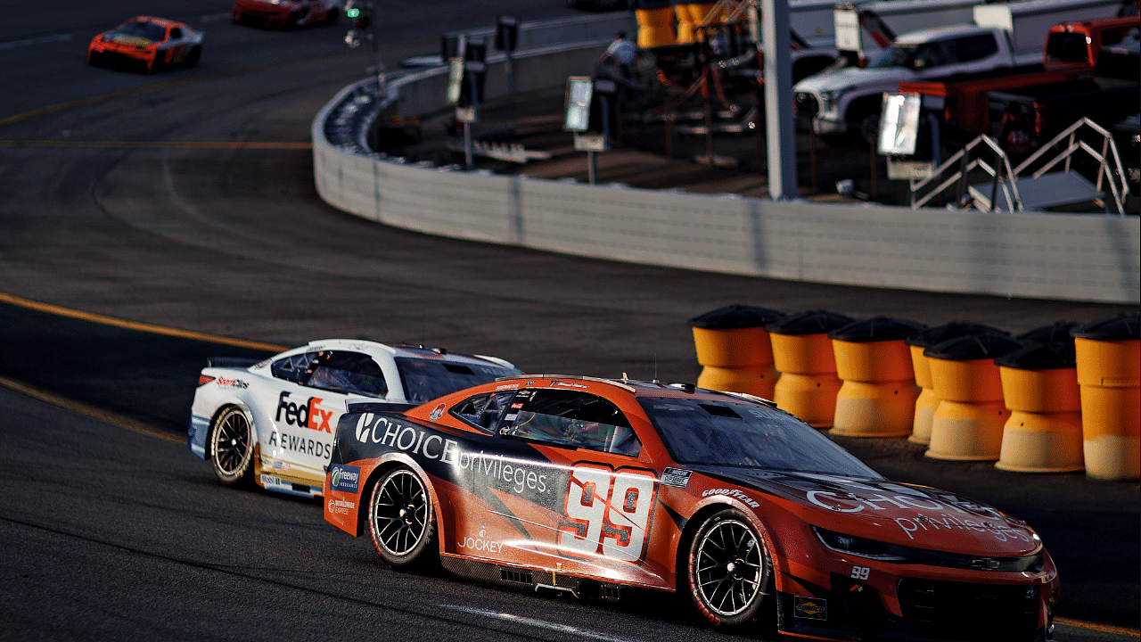 Aug 11, 2024; Richmond, Virginia, USA; NASCAR Cup Series driver Daniel Suarez (99) during the Cook Out 400 at Richmond Raceway. Mandatory Credit: Peter Casey-Imagn Images