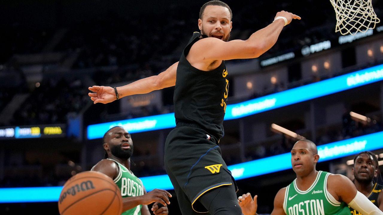 Golden State Warriors guard Stephen Curry (30) has the ball knocked out of his hands against the Boston Celtics in the third quarter at the Chase Center.