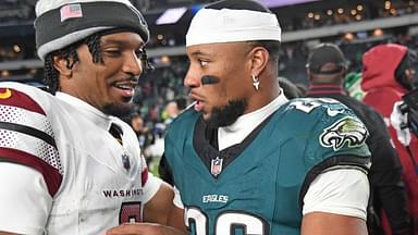 Washington Commanders quarterback Jayden Daniels (5) and Philadelphia Eagles running back Saquon Barkley (26) meet on the field after the game at Lincoln Financial Field.