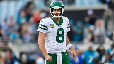 New York Jets quarterback Aaron Rodgers (8) looks on before an NFL football matchup Sunday, Dec. 15, 2024 at EverBank Stadium in Jacksonville, Fla