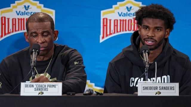 Colorado Buffaloes head coach Deion Sanders and quarterback Shedeur Sanders (2) talk with the media after the game against the Brigham Young Cougars at Alamodome.