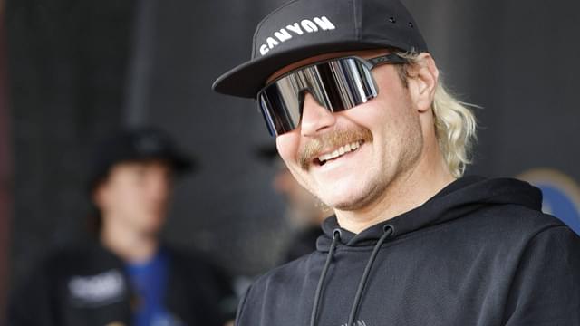 Finnish Formula 1 driver Valtteri Bottas reacts during a press conference, of the FNLD GRVL gravel race in Lahti, Finland, on June 14, 2024