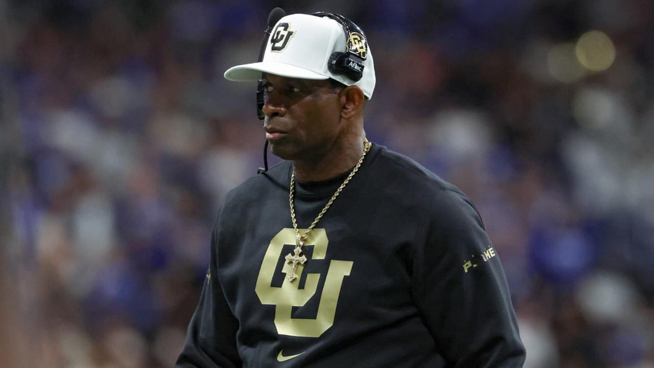 Dec 28, 2024; San Antonio, TX, USA; Colorado Buffaloes head coach Deion Sanders walks on the field during the game against the Brigham Young Cougars at Alamodome.