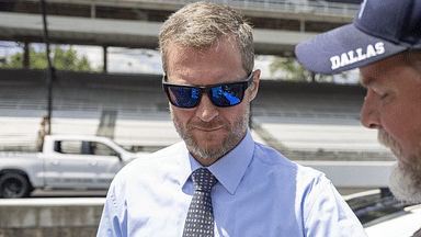 Dale Earnhardt Jr. signs an autograph before the Verizon 200 at the Indianapolis Motor Speedway Road Course.