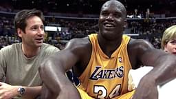 Laker center Shaquille O'Neal sits next to \"X-Files\" star David Duchovny after being taken out of the games in the 4th quarter of the 1st round NBA Playoff game at Staples Center. The Lakers won 106-83.