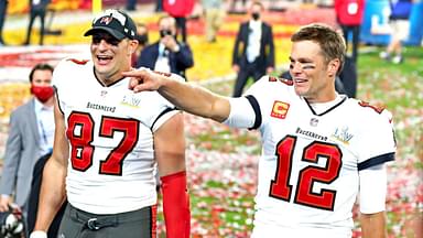 Tampa Bay Buccaneers quarterback Tom Brady (12) and tight end Rob Gronkowski (87) celebrate after beating the Kansas City Chiefs in Super Bowl LV at Raymond James Stadium.