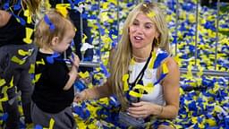 Kelly Stafford, wife of Los Angeles Rams quarterback Matthew Stafford (not pictured) plays with their daughters in the confetti as they celebrate after defeating the Cincinnati Bengals during Super Bowl LVI at SoFi Stadium.