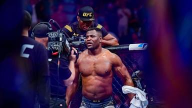 Francis Ngannou celebrates the win against Ciryl Gane during UFC 270 at Honda Center.