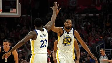 Golden State Warriors forward Kevin Durant (35) celebrates with forward Draymond Green (23) against the LA Clippers in the first half of game six of the first round of the 2019 NBA Playoffs at Staples Center.