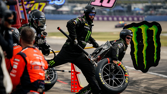 NASCAR Cup Series driver Riley Herbst’s pit crew leaps into action during the Ally 400 at Nashville Superspeedway in Lebanon, Tenn., Sunday, June 30, 2024.