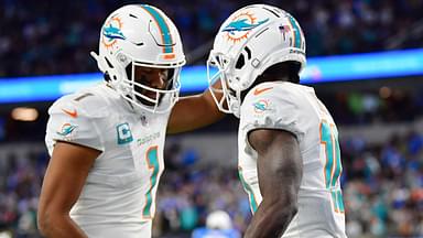 Dec 11, 2022; Inglewood, California, USA; Miami Dolphins wide receiver Tyreek Hill (10) celebrates his touchdown scored against the Los Angeles Chargers with quarterback Tua Tagovailoa (1) during the first half at SoFi Stadium.