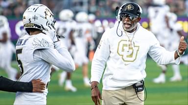 CU football head coach Deion Sanders, or Coach Prime, gives instruction to wide receiver Jimmy Horn Jr. (5) against CSU in the Rocky Mountain Showdown at Canvas Stadium on Saturday, Sept. 14, 2024, in Fort Collins, Colo.