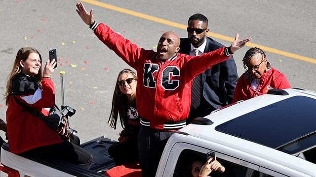 Kansas City mayor Quinton Lucas celebrates with fans in the parade during the celebration of the Kansas City Chiefs winning Super Bowl LVIII.