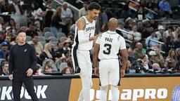 San Antonio Spurs center Victor Wembanyama (1) talks with guard Chris Paul (3) in the first half against the Portland Trail Blazers at Frost Bank Center.