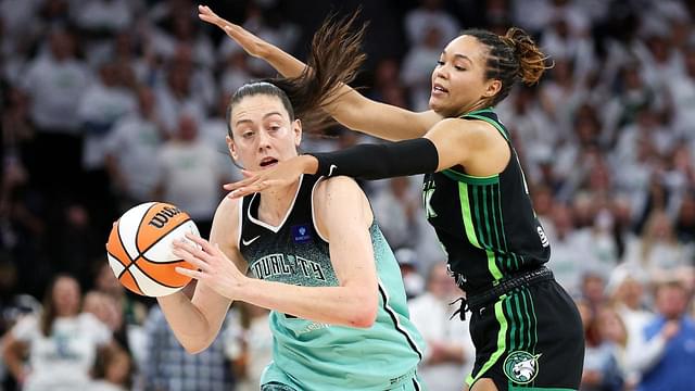 Minnesota Lynx forward Napheesa Collier (24) defends against New York Liberty forward Breanna Stewart (30) during the second half of game three of the 2024 WNBA Finals at Target Center.