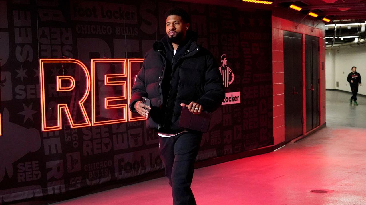 Philadelphia 76ers forward Paul George (8) walks into the United Center before the game against the Chicago Bulls.