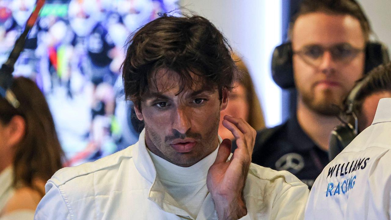 Sainz, driver of Williams Racing Formula One Team with the FW46 F1 race car no 55, spotted in the pit with a white track suit and helmet during post-season test day at the YAS circuit, after the F1 Grand Prix of Abu Dhabi at Yas Marina Circuit