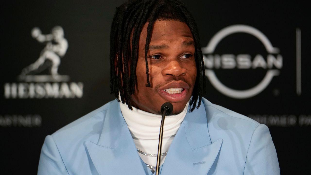 Colorado Buffaloes wide receiver/cornerback Travis Hunter speaks on stage during a press conference before the 2024 Heisman Trophy Presentation.