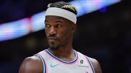 Miami Heat forward Jimmy Butler (22) looks on against the Denver Nuggets during the third quarter at Kaseya Center.