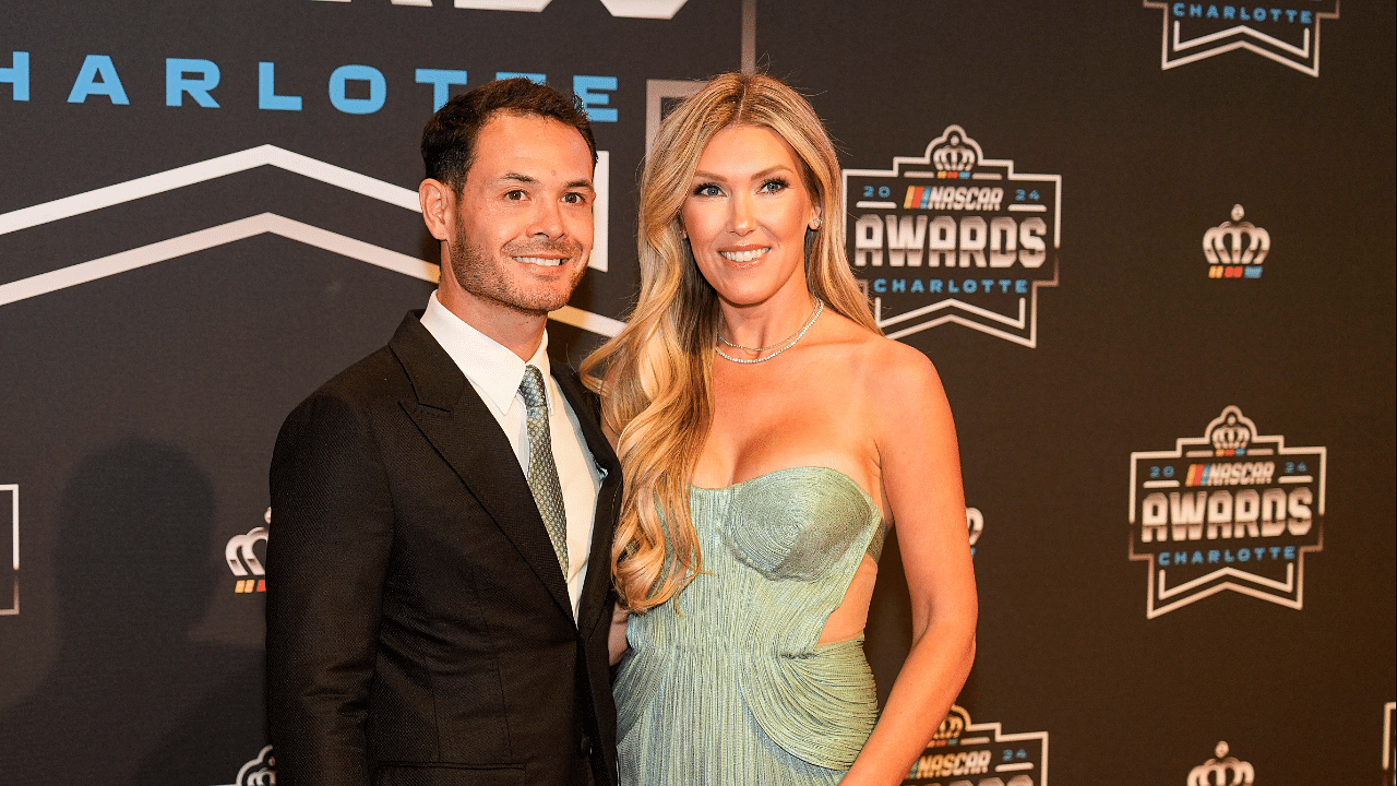 Nov 22, 2024; Charlotte, NC, USA; NASCAR Cup Series driver Kyle Larson (5) and his wife Kelly during the NASCAR Awards Banquet at Charlotte Convention Center. Mandatory Credit: Jim Dedmon-Imagn Images