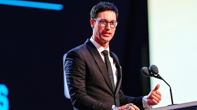 NASCAR Cup Series driver Joey Logano (22) talks to the audience after being announced as the three time Cup champion during the NASCAR Awards Banquet at Charlotte Convention Center.