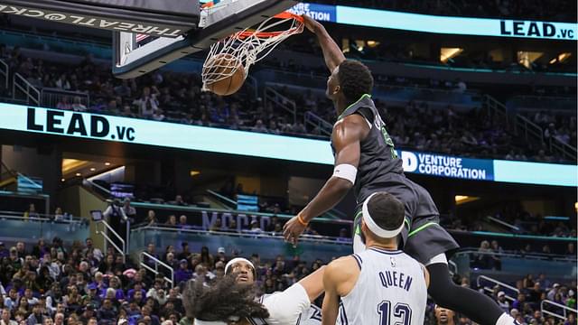 Minnesota Timberwolves guard Anthony Edwards (5) dunks during the second half against the Orlando Magic at Kia Center.