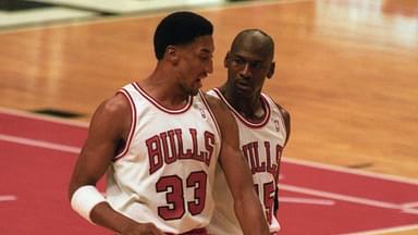 Chicago Bulls guard Michael Jordan (45) talks with forward Scottie Pippen (33) after a timeout from the game against the Boston Celtics at Chicago Stadium. The Bulls beat the Celtics 100-82.