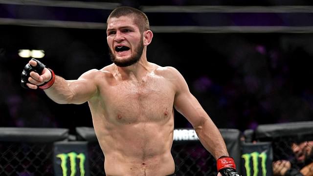 Khabib Nurmagomedov (red gloves) reacts after his fight against Conor McGregor (blue gloves) during UFC 229 at T-Mobile Arena.