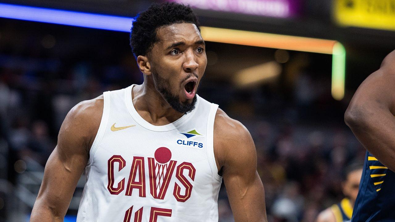 Cleveland Cavaliers guard Donovan Mitchell (45) reacts to a made shot and foul the first half against the Indiana Pacers at Gainbridge Fieldhouse