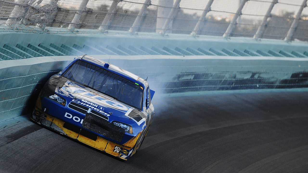 NASCAR Sprint Cup Series driver Kurt Busch hits the wall during the Ford 400 at Homestead Miami Speedway.