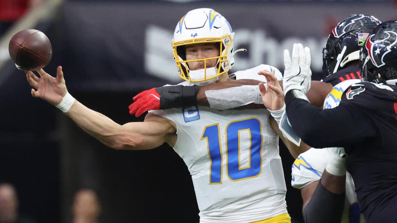 Jan 11, 2025; Houston, Texas, USA; Los Angeles Chargers quarterback Justin Herbert (10) passes during the second quarter against the Houston Texans in an AFC wild card game at NRG Stadium.