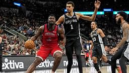 New Orleans Pelicans forward Zion Williamson (1) drives to the basket while defended by San Antonio Spurs forward Victor Wembanyama (1) during the first half at Frost Bank Center