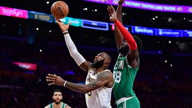 Los Angeles Lakers forward LeBron James (23) shoots ahead of Boston Celtics center Neemias Queta (88) during the first half at Crypto.com Arena.