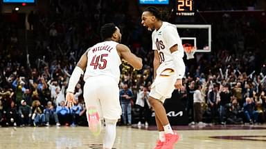 Cleveland Cavaliers guard Donovan Mitchell (45) and guard Darius Garland (10) celebrate after Mitchell made a three point basket during the second half against the Oklahoma City Thunder at Rocket Mortgage FieldHouse.