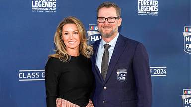 Jan 19, 2024; Charlotte, NC, USA; Dale Earnhardt Jr. and his wife Amy during the red carpet at Charlotte Convention Center Crown Ballroom. Mandatory Credit: Jim Dedmon-Imagn Images