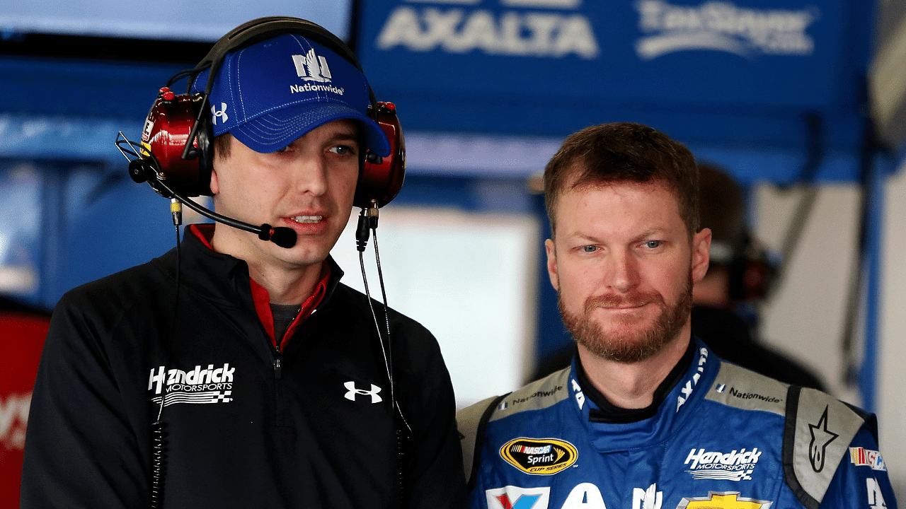 NASCAR Sprint Cup Series driver Dale Earnhardt Jr. (right) with his crew chief Greg Ives during practice for the Daytona 500 at Daytona International Speedway.