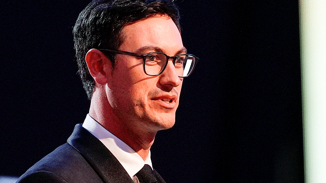 NASCAR Cup Series driver Joey Logano (22) talks to the audience after being announced as the three time Cup champion during the NASCAR Awards Banquet at Charlotte Convention Center.