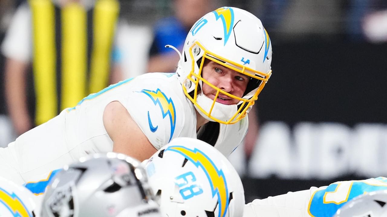 Jan 5, 2025; Paradise, Nevada, USA; Los Angeles Chargers quarterback Justin Herbert (10) looks to snap the ball against the Las Vegas Raiders during the fourth quarter at Allegiant Stadium.