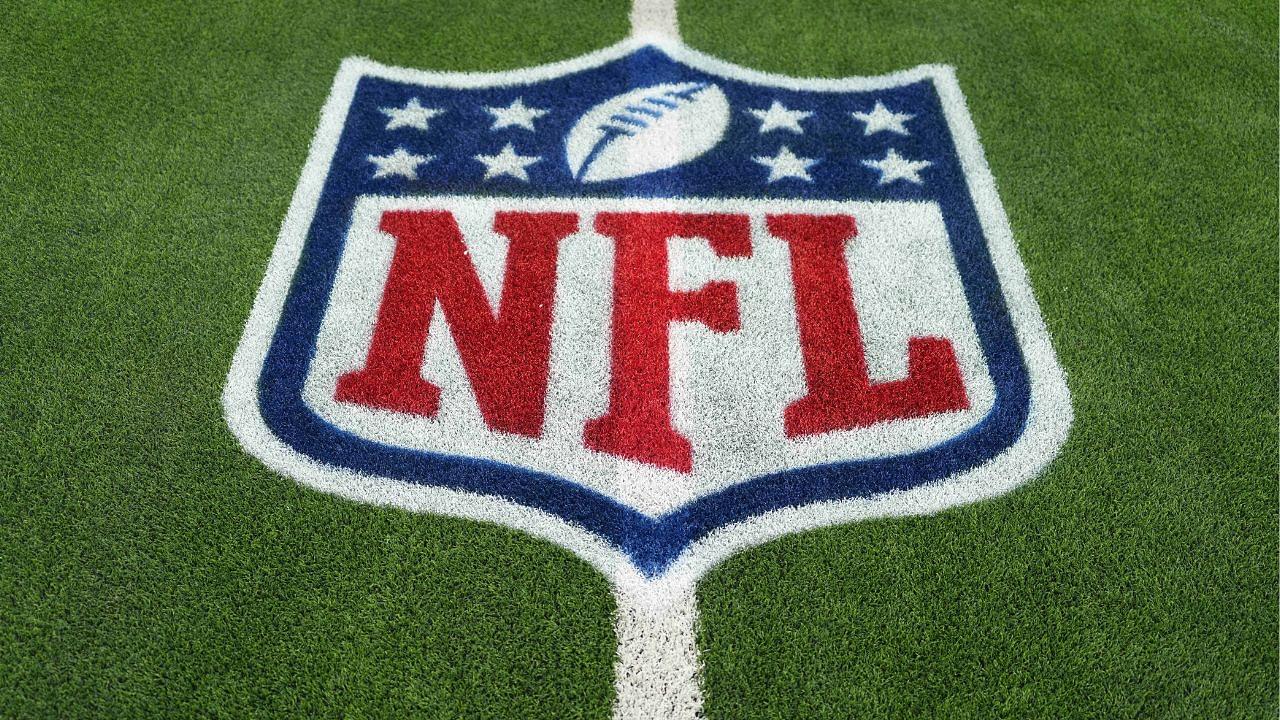 The NFL shield logo is seen on the field at SoFi Stadium before a game between the Arizona Cardinals and Los Angeles Rams.