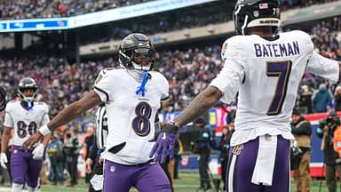 Baltimore Ravens quarterback Lamar Jackson (8) and wide receiver Rashod Bateman (7) celebrates after a touchdown pass during the first half against the New York Giants at MetLife Stadium.