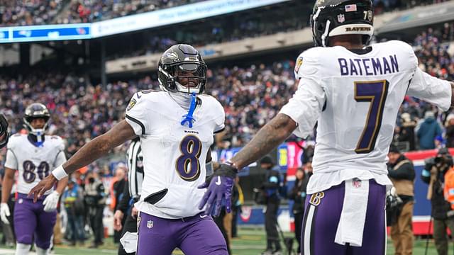 Baltimore Ravens quarterback Lamar Jackson (8) and wide receiver Rashod Bateman (7) celebrates after a touchdown pass during the first half against the New York Giants at MetLife Stadium.