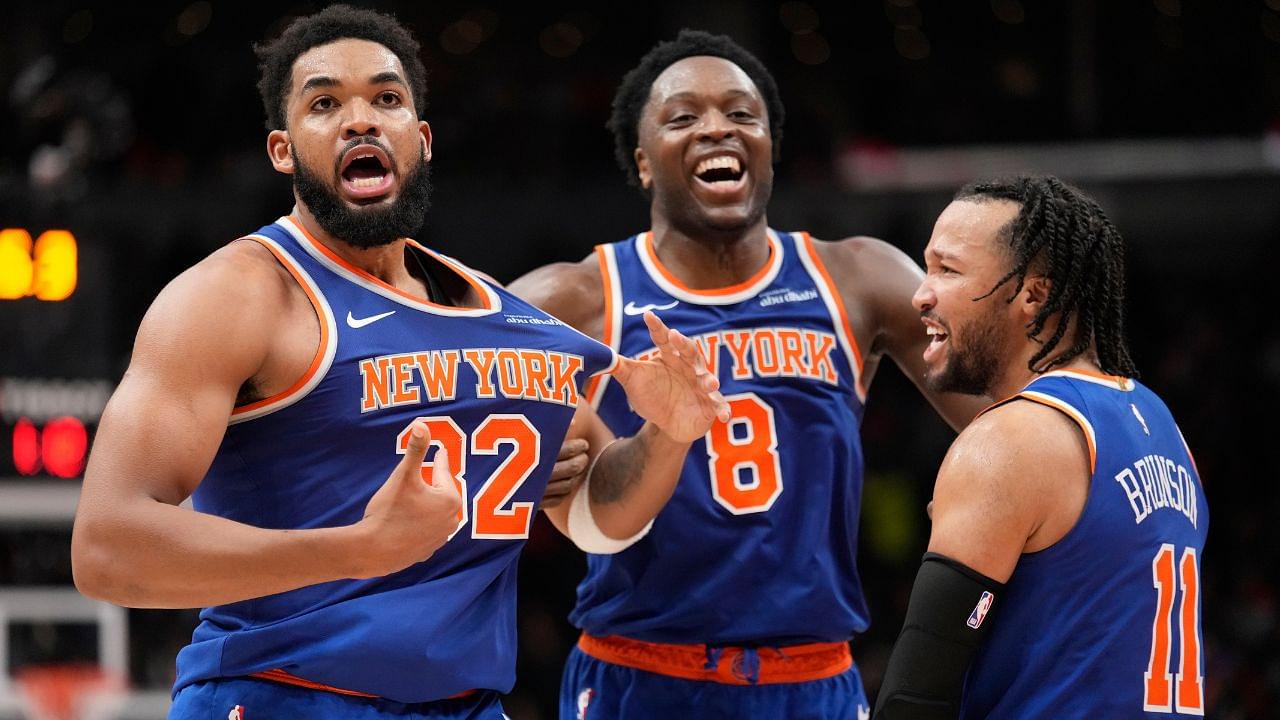 New York Knicks guard Jalen Brunson (11) and forward OG Anunoby (8) react after a three point basket by center Karl-Anthony Towns (32) to clinch a win over the Toronto Raptors during the second half at Scotiabank Arena.