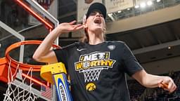 Iowa Hawkeyes guard Caitlin Clark (22) cuts down the net after beating LSU in the Elite 8 round of the NCAA Women's Basketball Tournament between Iowa and LSU at MVP Arena, Monday, April 1, 2024 in Albany, N.Y.